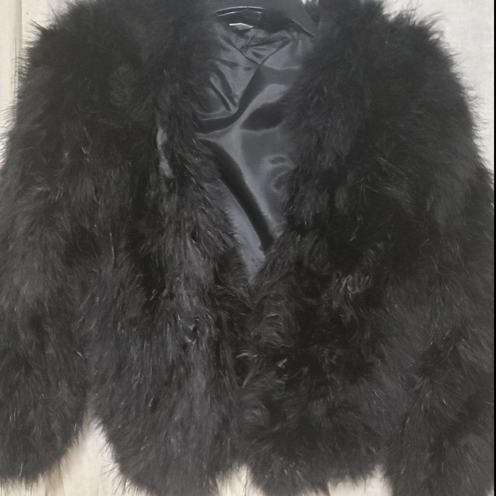 Black boa jacket clasp and snap closure.
